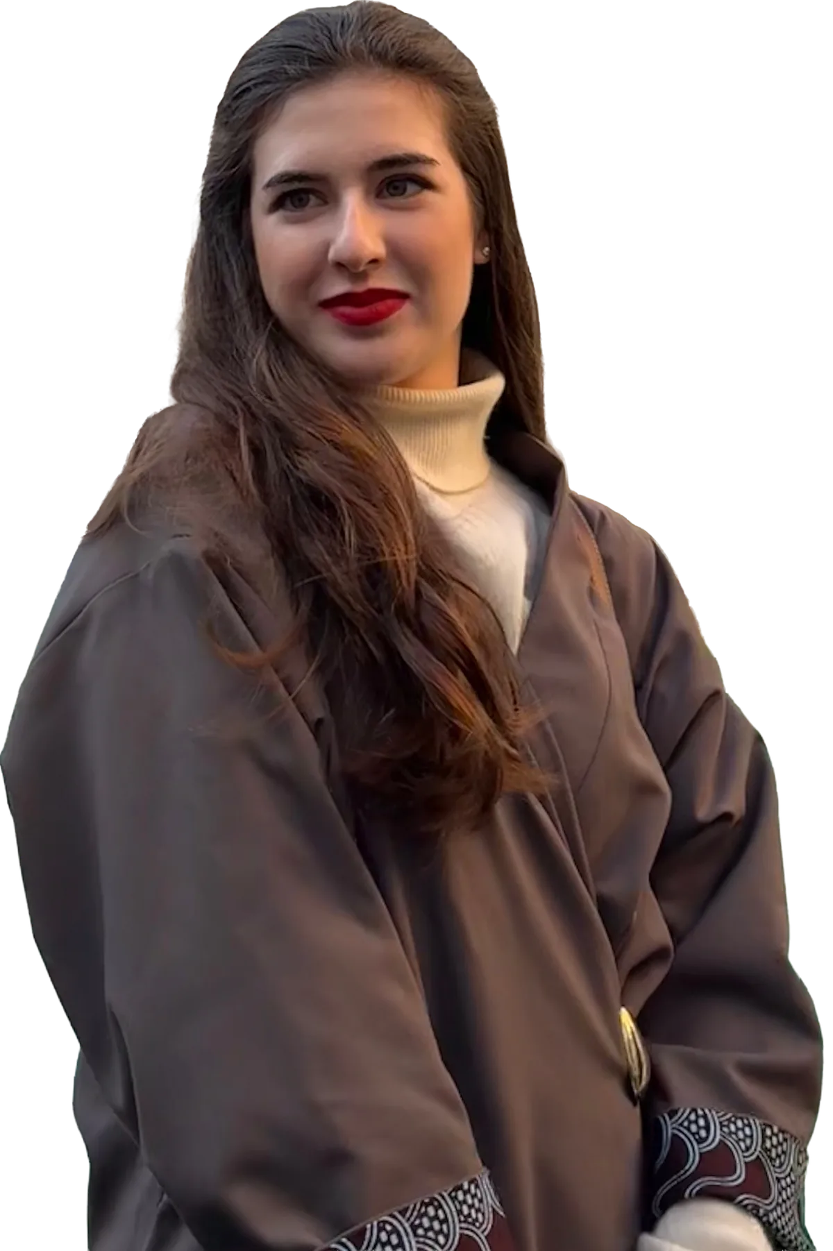 Virginia Kate Brandt — portrait in a brown wool coat at the Trevi Fountain in Rome.
